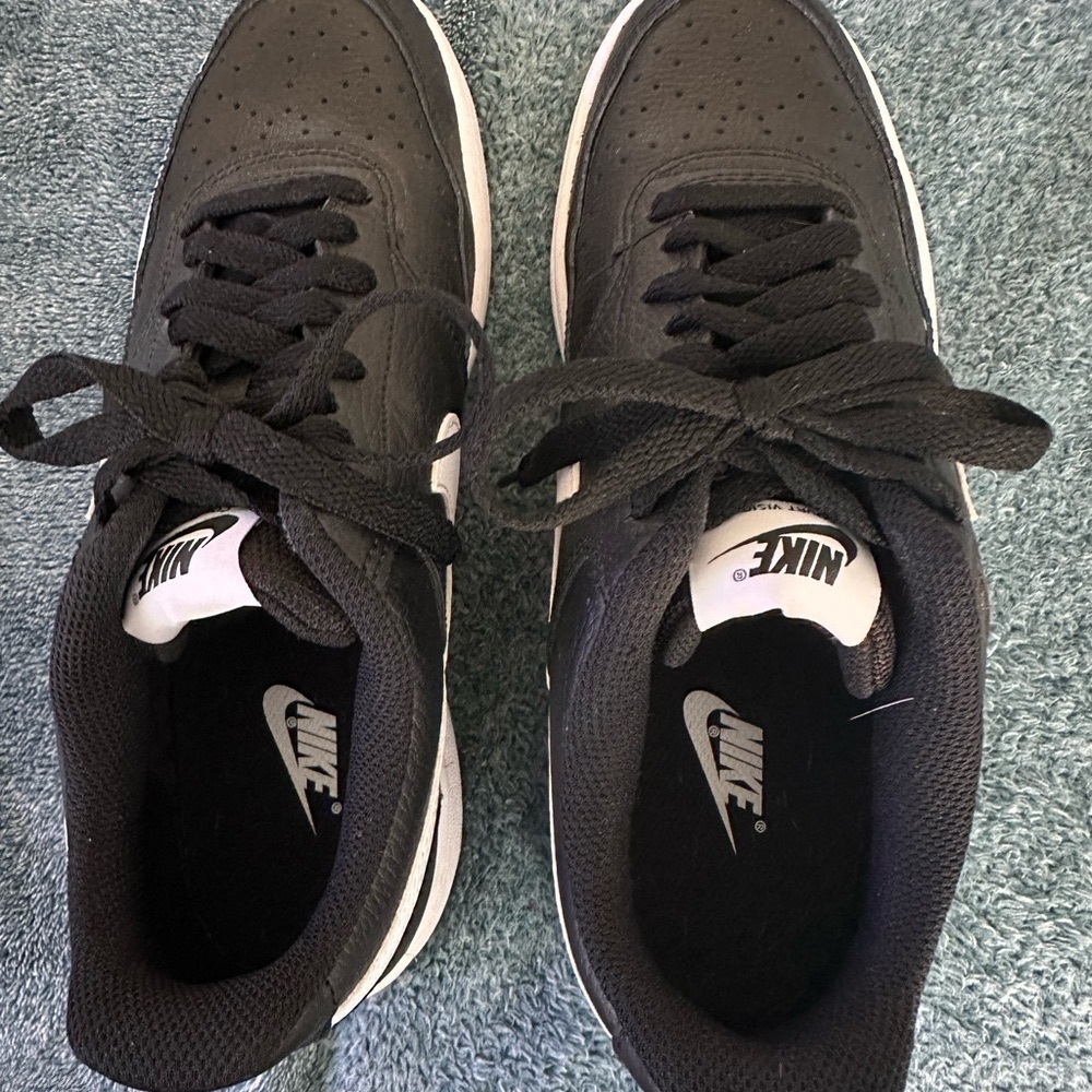 Women’s size 10 gently worn Nike Black and White Athletic Shoes